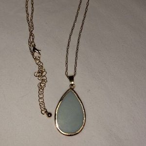 Gold necklace with stone pendant